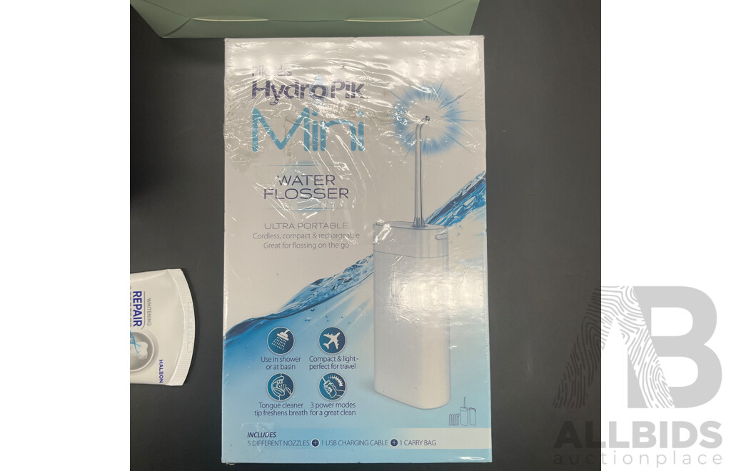 BRAUN Oral-B Pro 1500X Electric Toothbrush, WHITE GLO Advanced Teeth Whitening Kit, PIKSTERS HydroPik Mini Water Flosser and SENDOSDYNE Toothpaste - Lot of 4