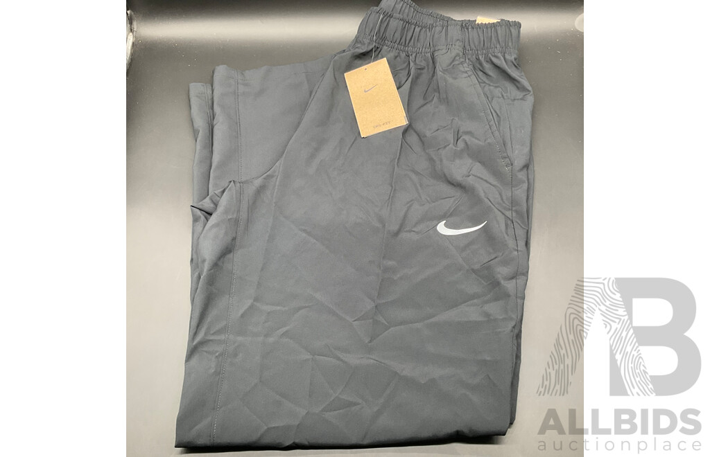 Assorted Men's Clothing , Including NIKE and UNDER ARMOUR Size M and L - Lot of 4