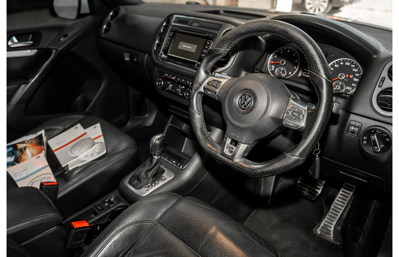 10/2014 Volkswagen Tiguan 155 TSI R-Line (4x4) 5NC MY15 4d Wagon White Turbo Diesel 2.0L