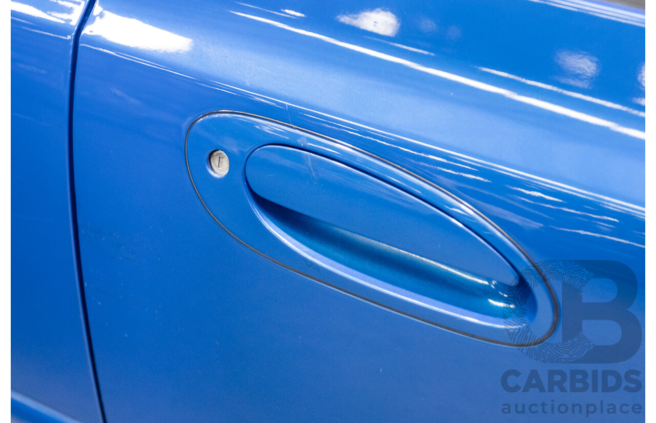 4/2006 Ford Falcon XR6 BF 4d Sedan Shockwave Mica Blue V6 4.0L