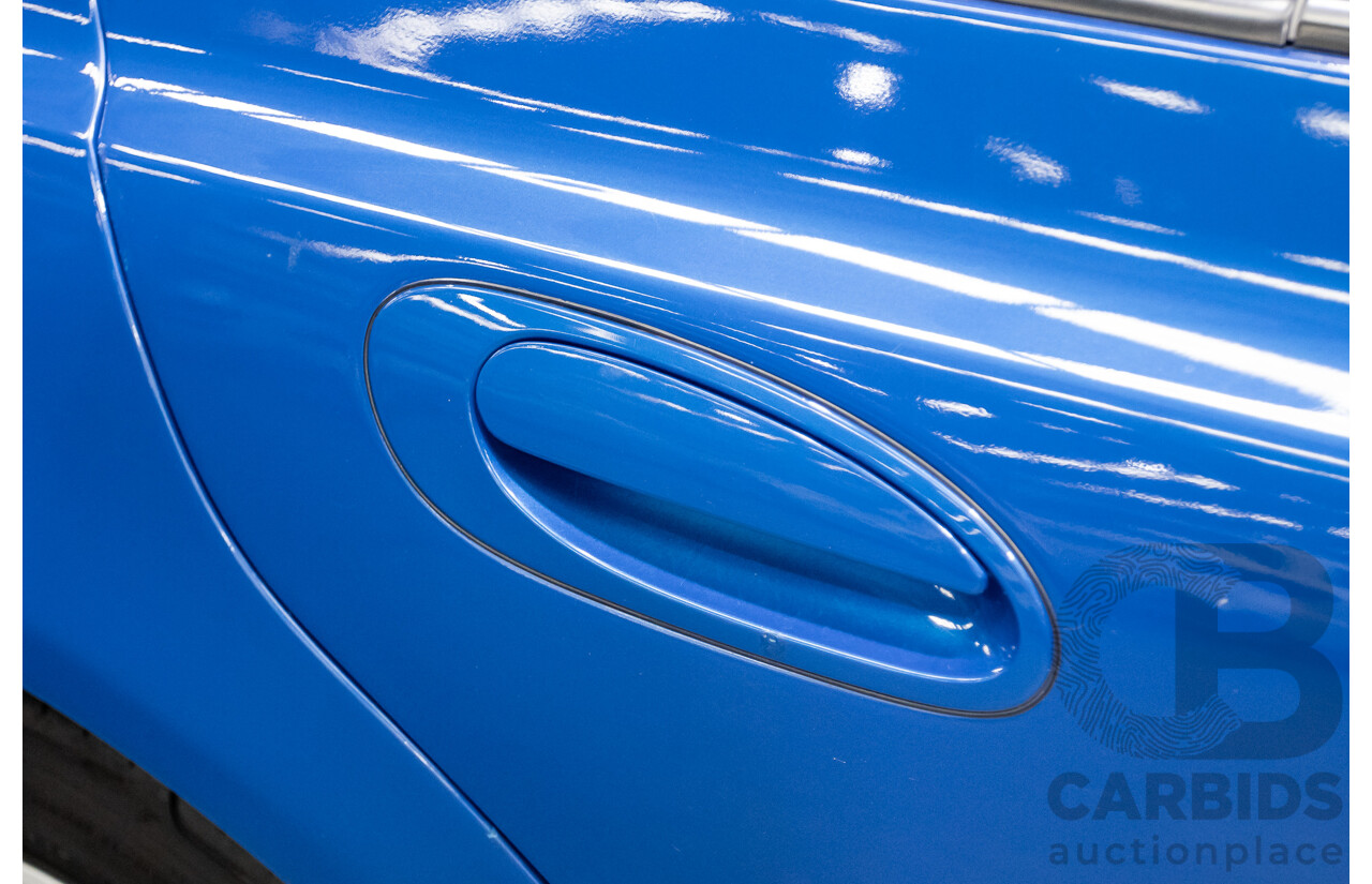 4/2006 Ford Falcon XR6 BF 4d Sedan Shockwave Mica Blue V6 4.0L