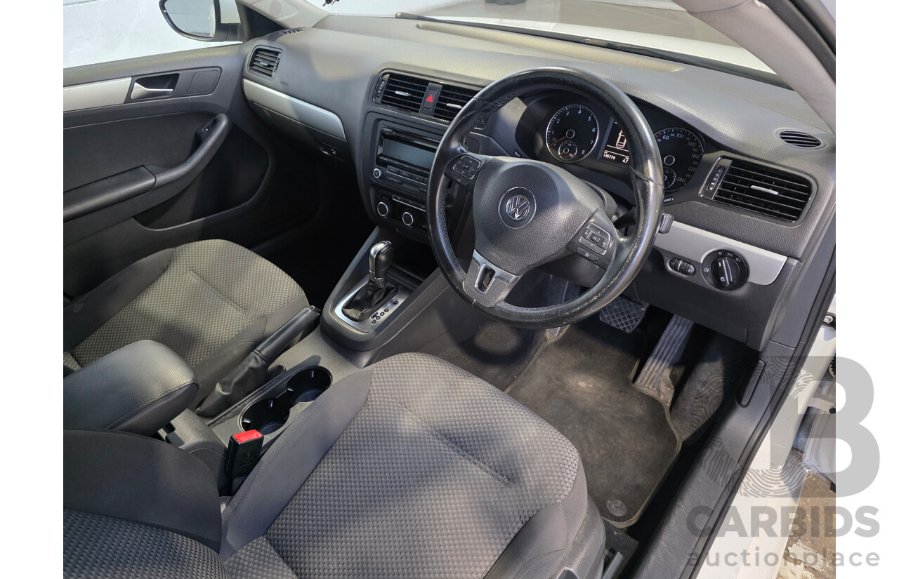 6/2013 Volkswagen Jetta 118 TSI 1KM MY13.5 4d Sedan White 1.4L