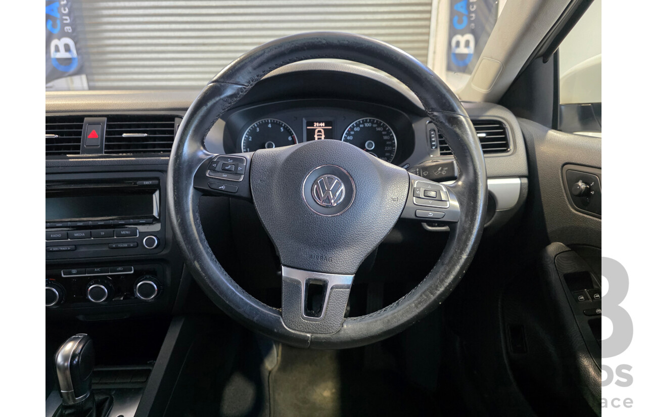 6/2013 Volkswagen Jetta 118 TSI 1KM MY13.5 4d Sedan White 1.4L