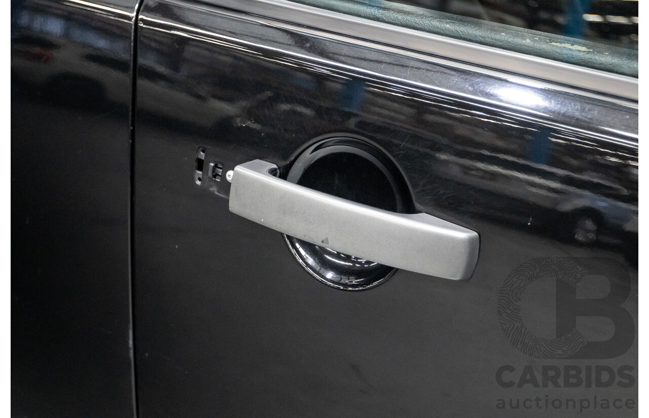 11/2014 Land Rover Discovery 3.0 TDV6 (4x4) MY15 4D Wagon Santorini Black Metallic Turbo Diesel 3.0L - 7 Seater
