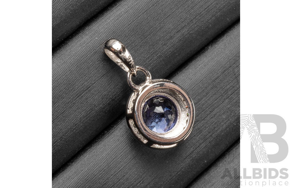 9ct White Gold Tanzanite & Diamond Pendant - 1.23gms
