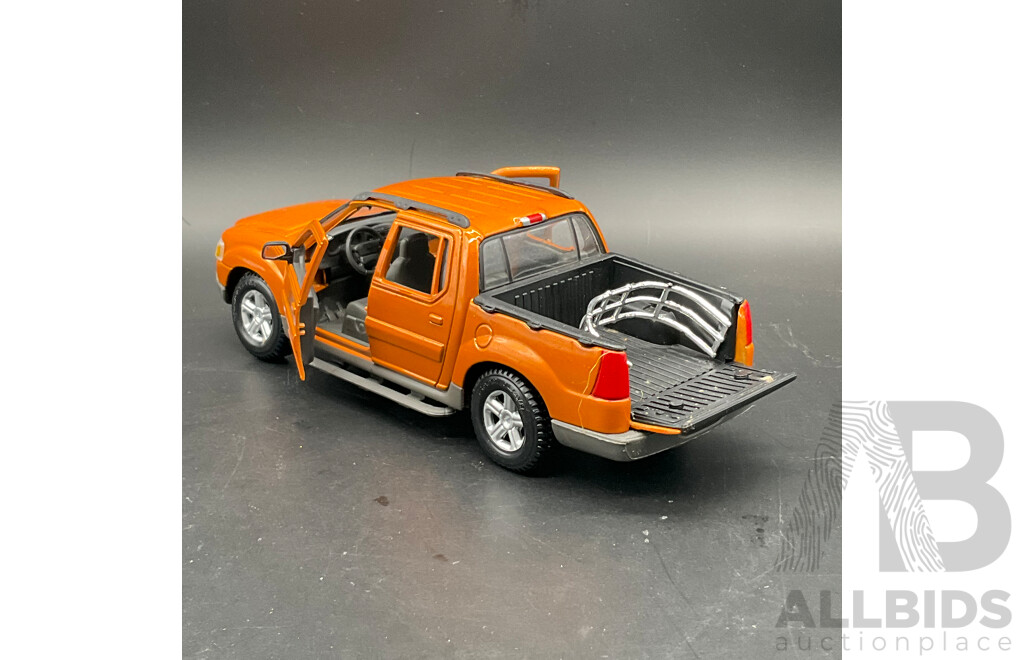 MAJORETTE 1936 Ford Pick Up (#4404), MIRA 1998 Ford Pick Up F-150 1:18 Scale Model Cars and MAISTO Ford Explorer Spot Trac 1:25 Model Car - Lot of 3