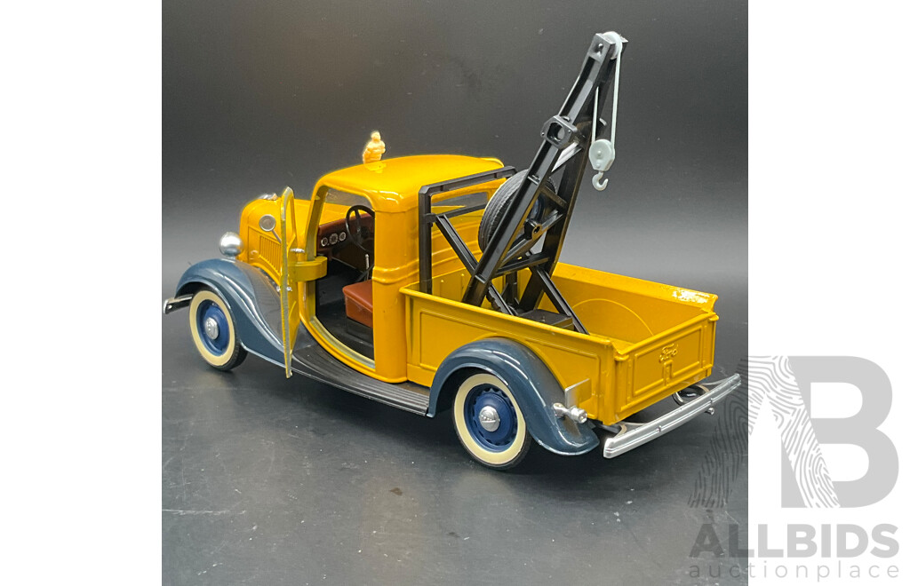 MAJORETTE 1936 Ford Pick Up (#4404), MIRA 1998 Ford Pick Up F-150 1:18 Scale Model Cars and MAISTO Ford Explorer Spot Trac 1:25 Model Car - Lot of 3