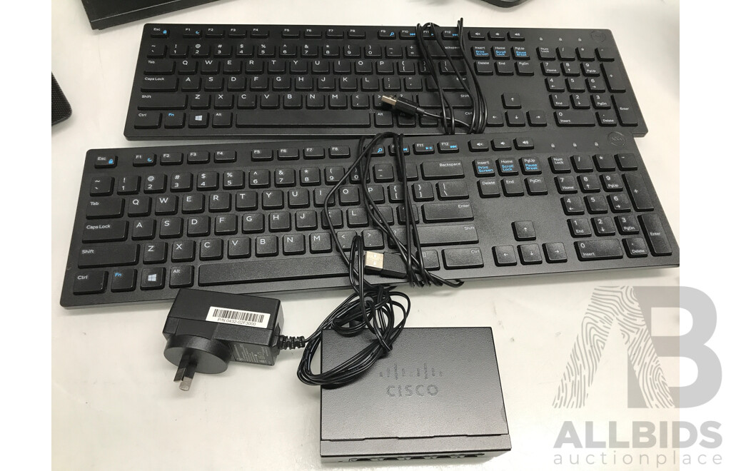 Lot of Dell LCD Monitors, Keyboards, Cisco Desktop Switch, and Logitech Computer Speakers