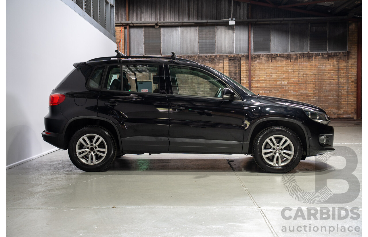 12/2012 Volkswagen Tiguan 103 TDI (AWD) 5NC MY13 4d Wagon Black Turbo Diesel 2.0L