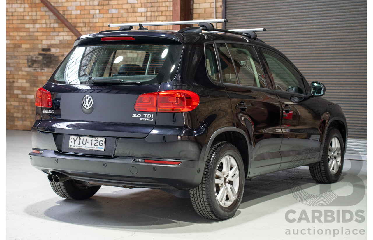 12/2012 Volkswagen Tiguan 103 TDI (AWD) 5NC MY13 4d Wagon Black Turbo Diesel 2.0L