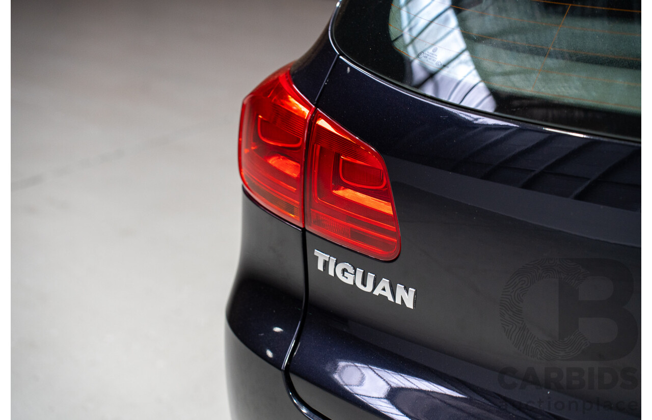 12/2012 Volkswagen Tiguan 103 TDI (AWD) 5NC MY13 4d Wagon Black Turbo Diesel 2.0L