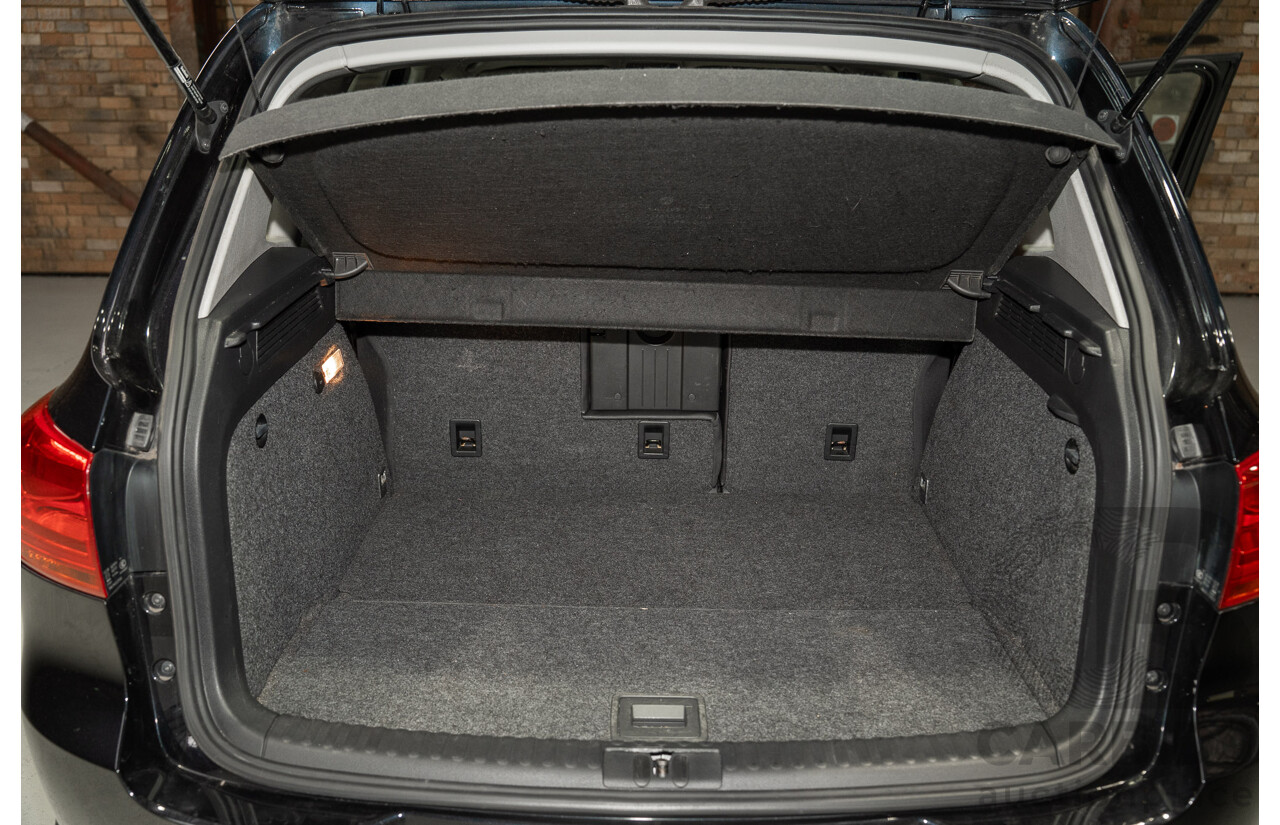 12/2012 Volkswagen Tiguan 103 TDI (AWD) 5NC MY13 4d Wagon Black Turbo Diesel 2.0L