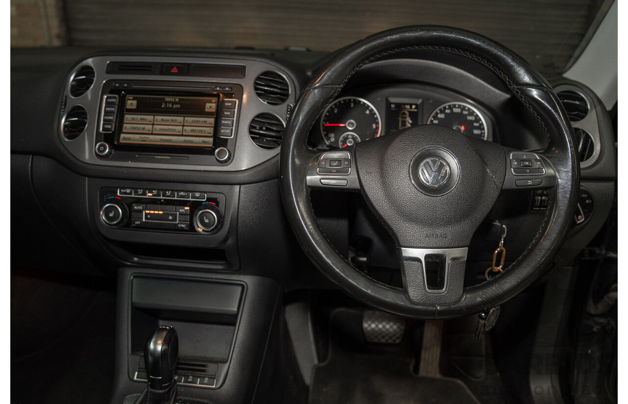 12/2012 Volkswagen Tiguan 103 TDI (AWD) 5NC MY13 4d Wagon Black Turbo Diesel 2.0L
