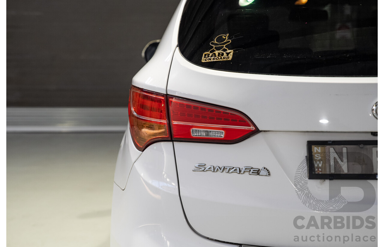 05/2014 Hyundai Santa Fe Highlander CRDi (4x4) DM 4d Wagon Pure White Metallic Turbo Diesel 2.2L