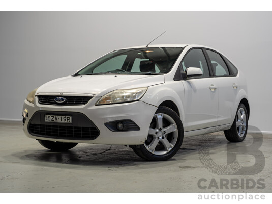 03/2010 Ford Focus LX FWD LV 5d Hatchback White 2.0L