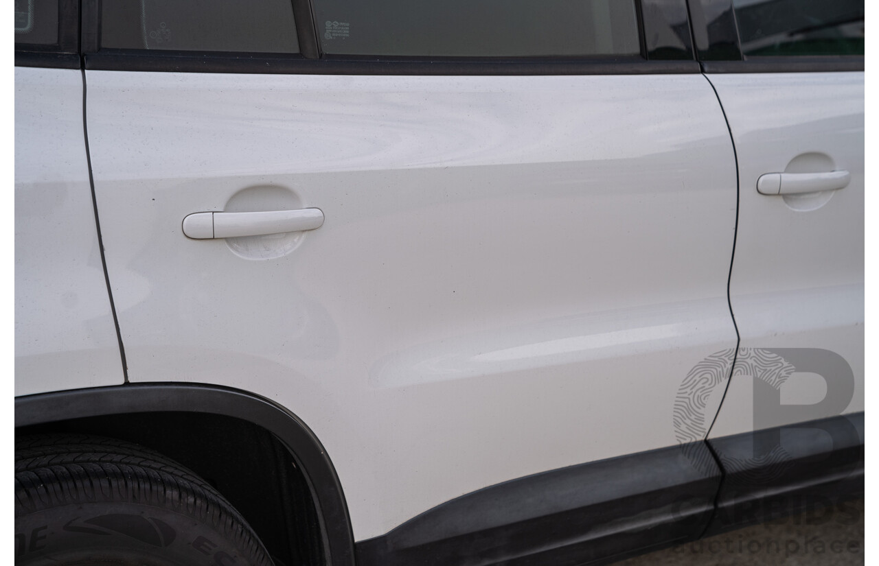 10/2013 Volkswagen Tiguan 118 TSI 5NC MY13 4d Wagon Candy White Twincharged 1.4L