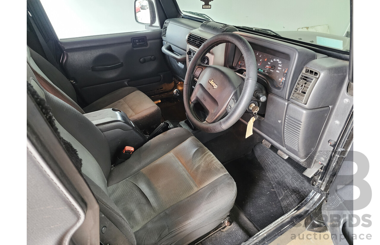 08/2006 Jeep Wrangler Sport (4x4) TJ 2d Softtop Black 4.0L