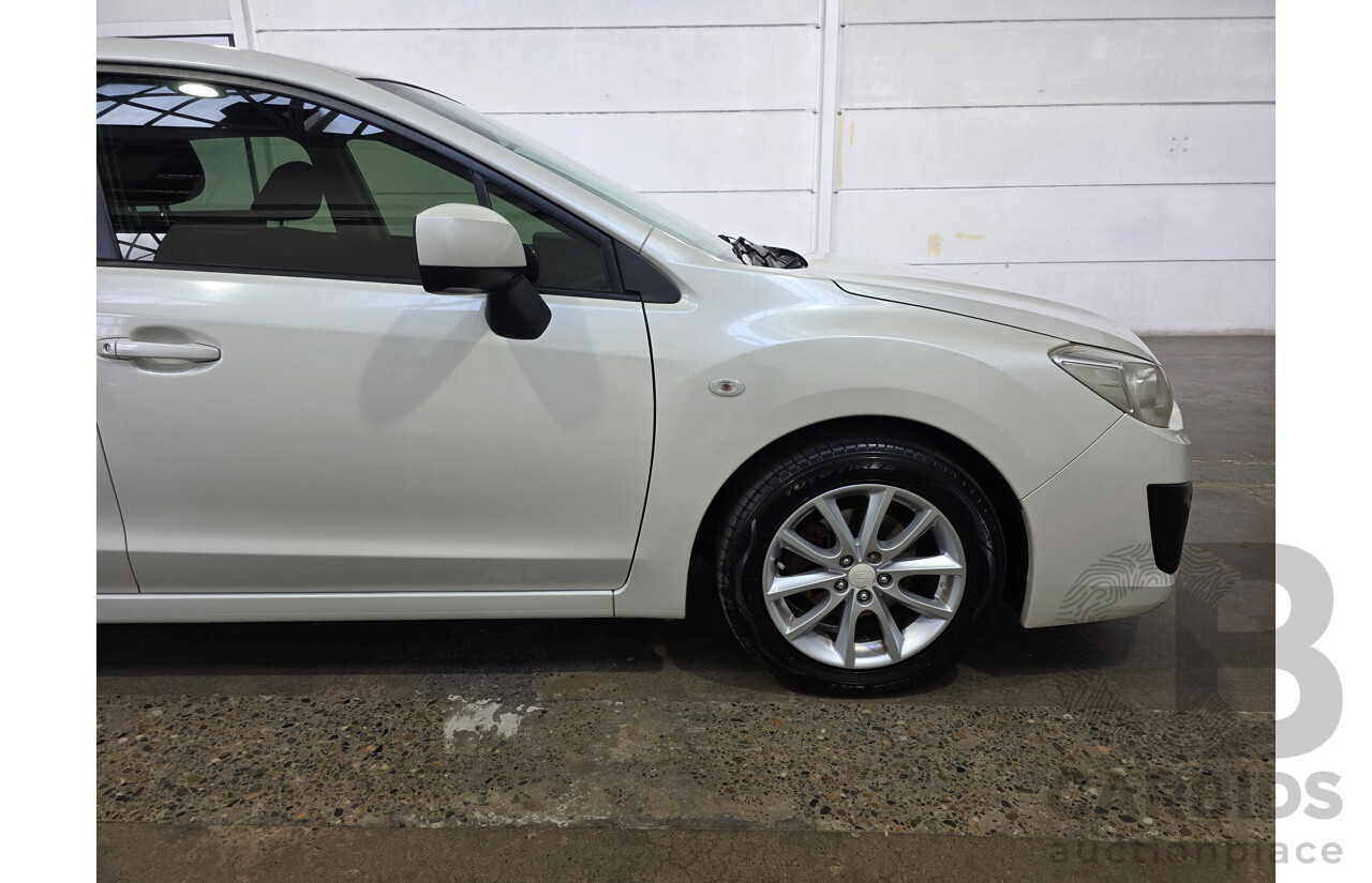 06/2012 Subaru Impreza 2.0i (AWD) MY12 5d Hatchback White 2.0L