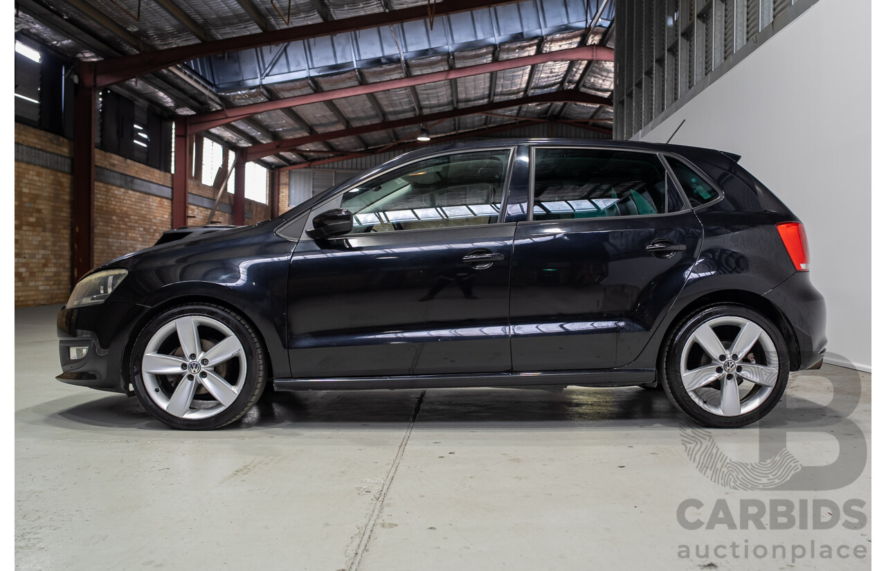 11/2010 Volkswagen Polo 77 TSI Comfortline 6R MY11 5d Hatchback Turbo Black 1.2L