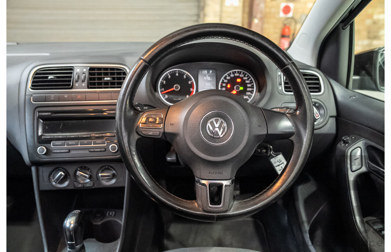 11/2010 Volkswagen Polo 77 TSI Comfortline 6R MY11 5d Hatchback Turbo Black 1.2L