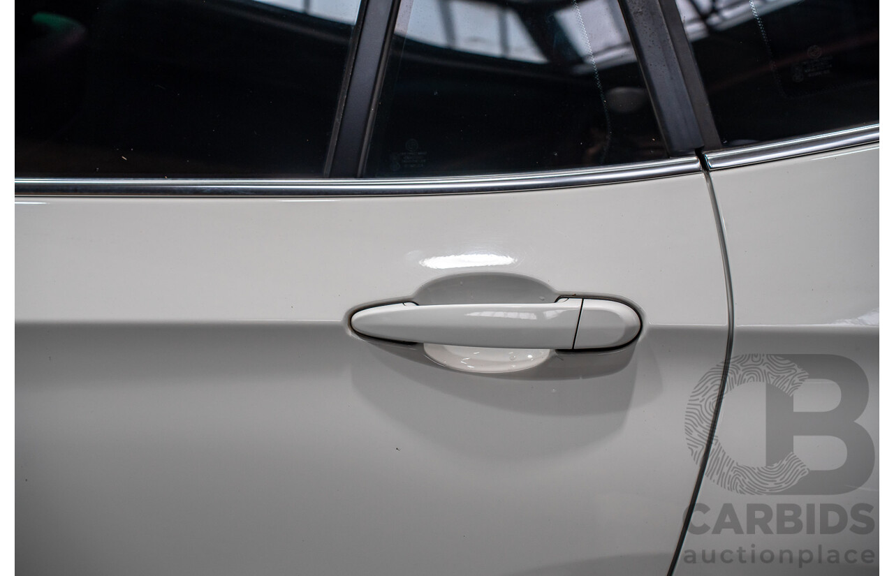 07/2011 BMW X1 xDrive 23d (AWD) E84 MY11 4d Wagon White Turbo Diesel 2.0L