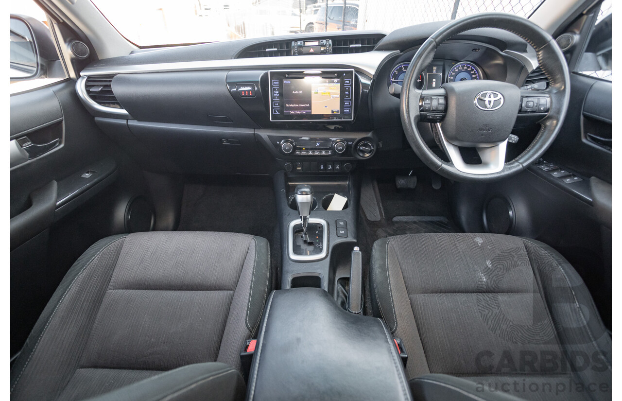 12/2017 Toyota Hilux SR5 (4x4) GUN126R Dual Cab Utility Glacier White Turbo Diesel 2.8L