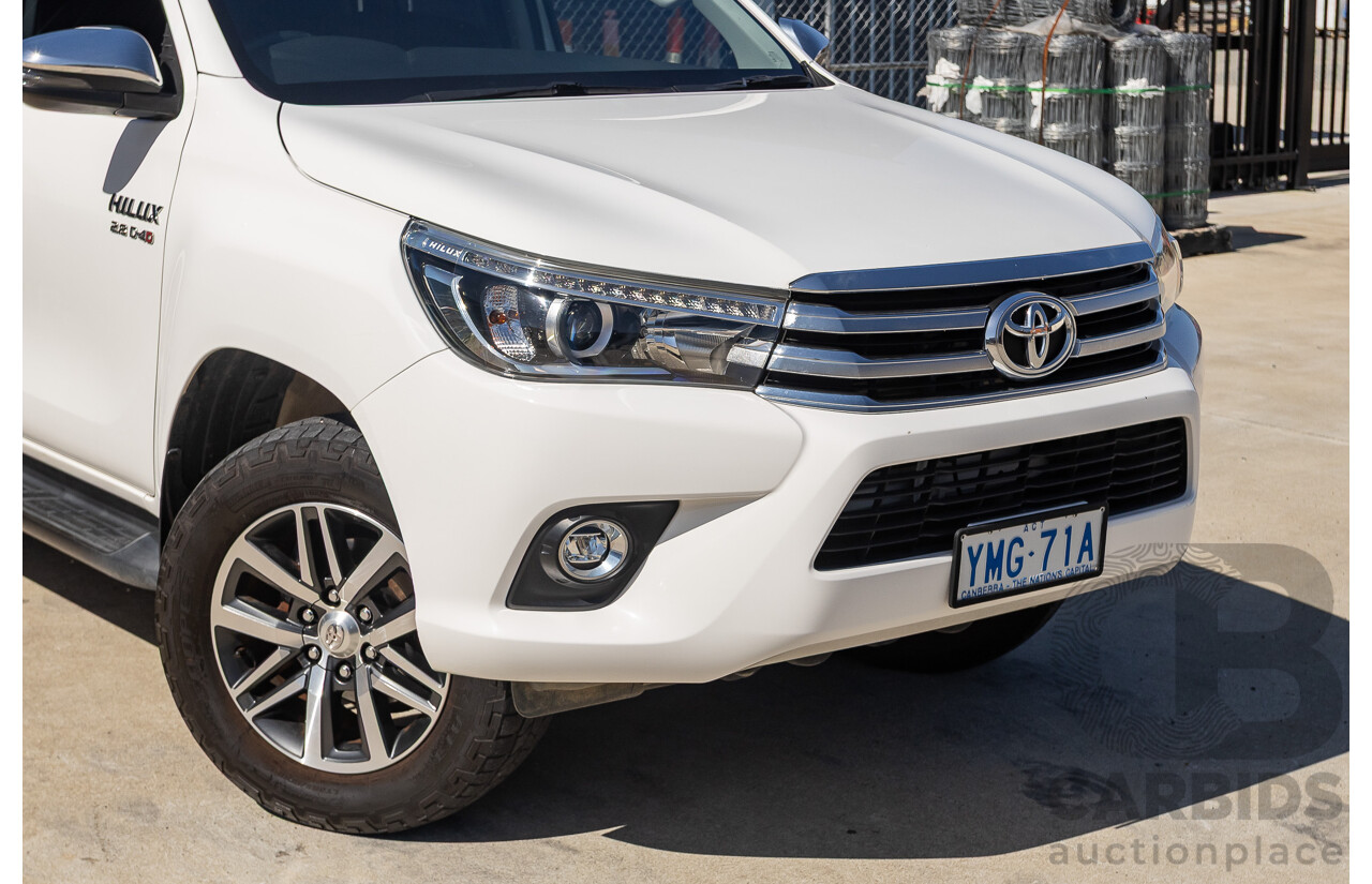 12/2017 Toyota Hilux SR5 (4x4) GUN126R Dual Cab Utility Glacier White Turbo Diesel 2.8L