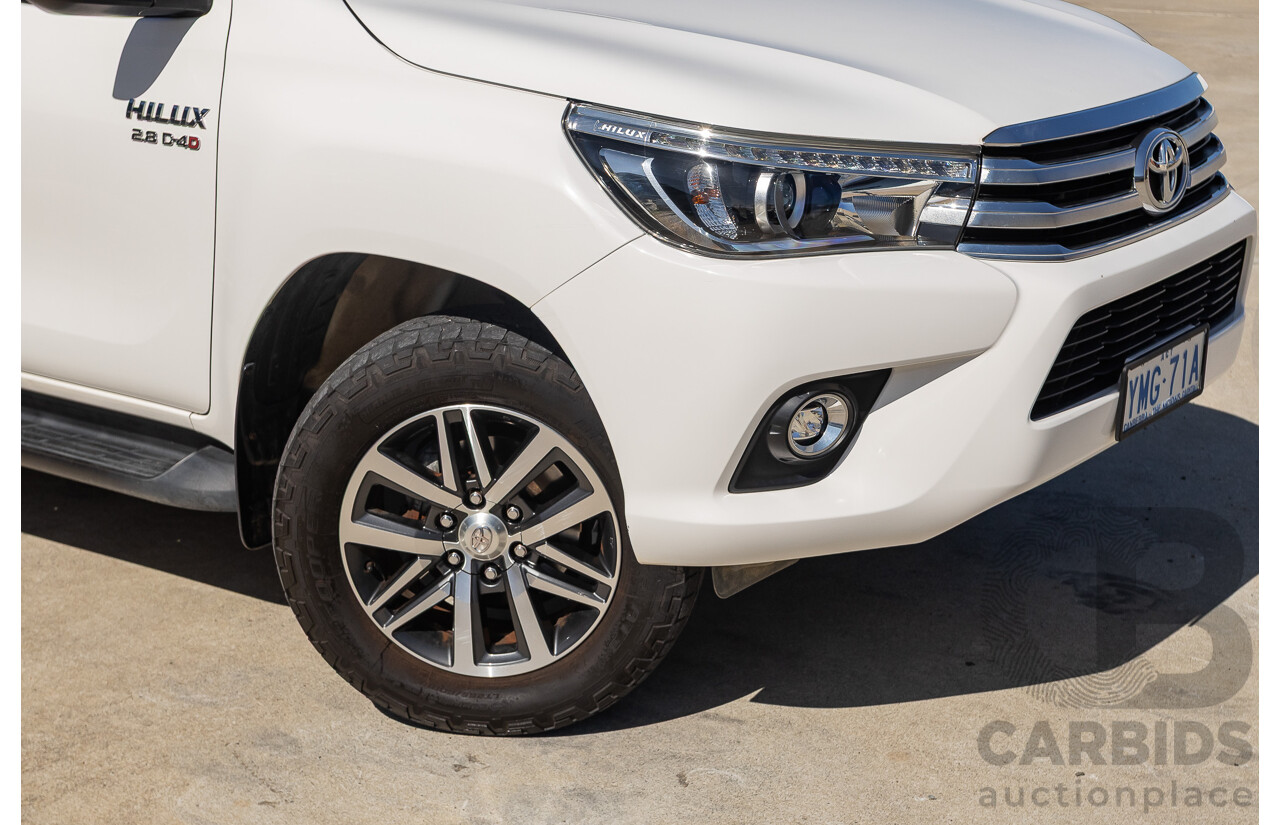 12/2017 Toyota Hilux SR5 (4x4) GUN126R Dual Cab Utility Glacier White Turbo Diesel 2.8L