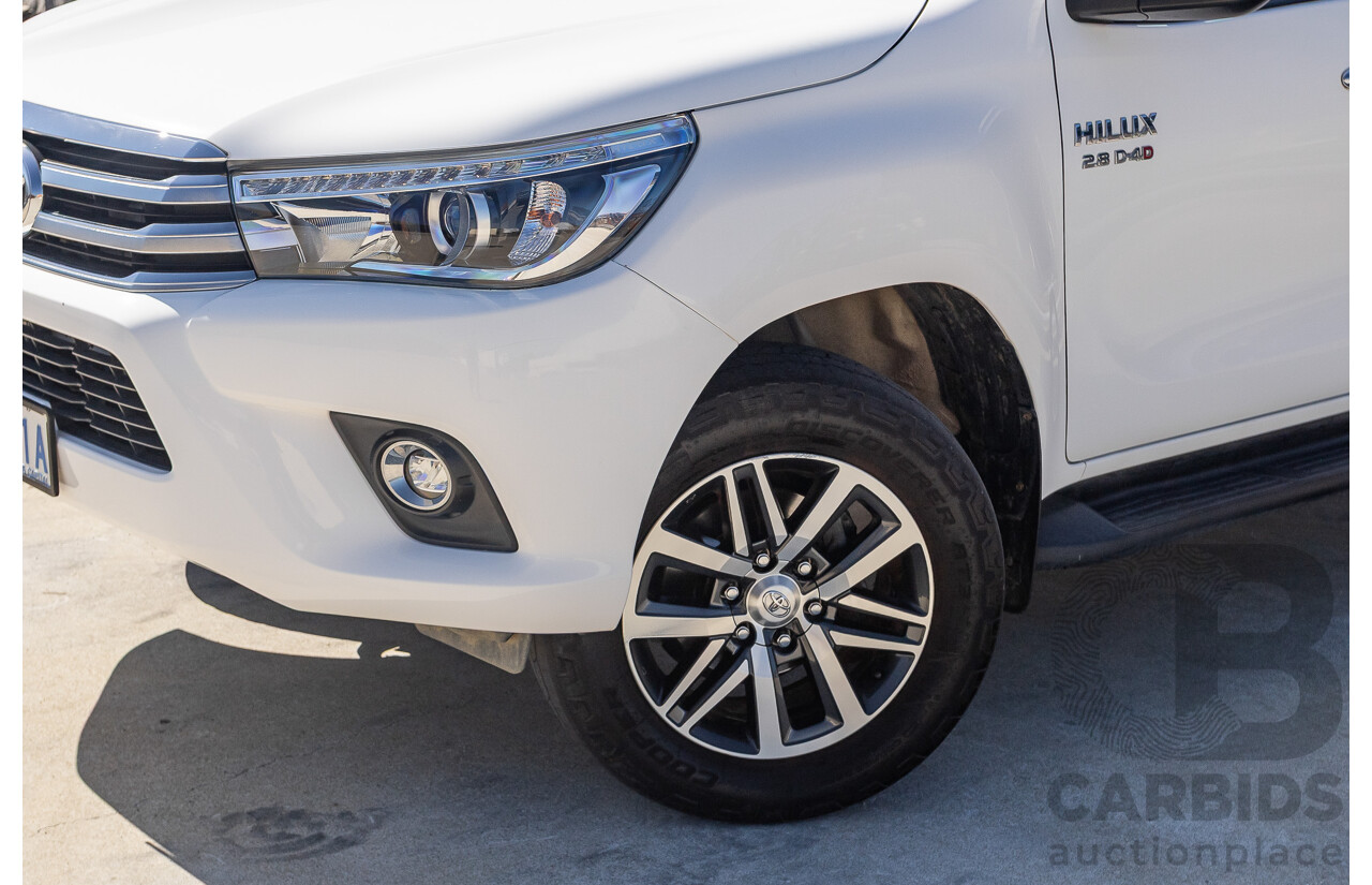 12/2017 Toyota Hilux SR5 (4x4) GUN126R Dual Cab Utility Glacier White Turbo Diesel 2.8L