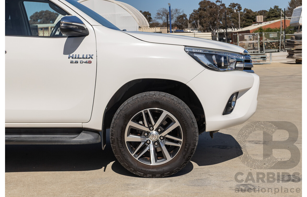 12/2017 Toyota Hilux SR5 (4x4) GUN126R Dual Cab Utility Glacier White Turbo Diesel 2.8L