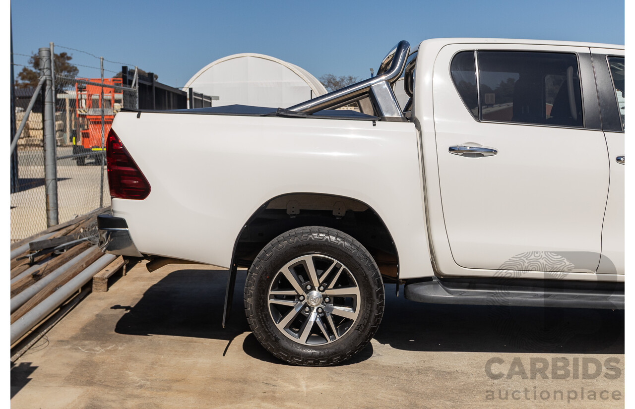 12/2017 Toyota Hilux SR5 (4x4) GUN126R Dual Cab Utility Glacier White Turbo Diesel 2.8L