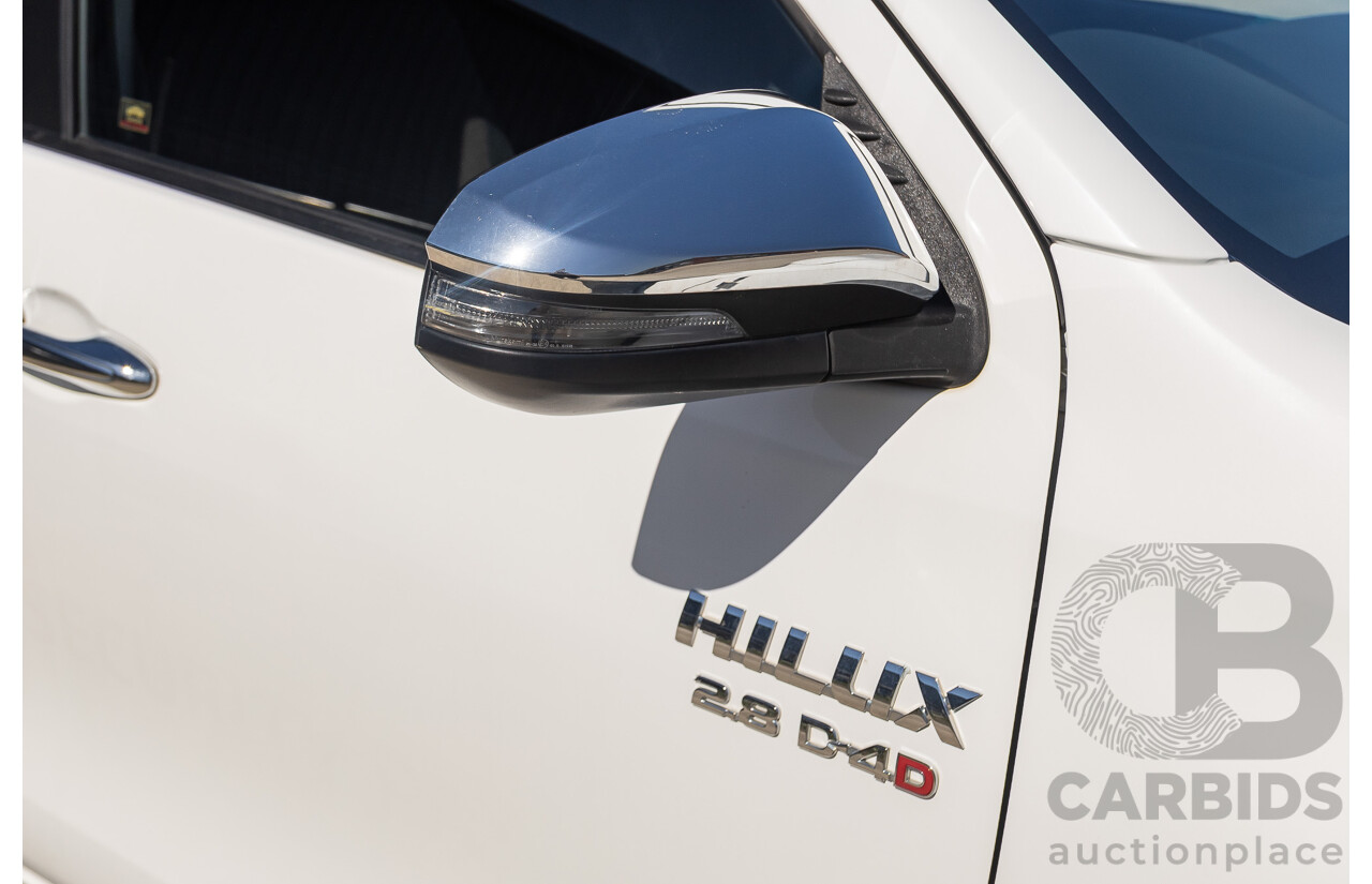12/2017 Toyota Hilux SR5 (4x4) GUN126R Dual Cab Utility Glacier White Turbo Diesel 2.8L