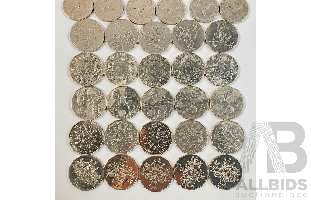 Twenty Five Australian Commemorative Fifty Cent Coins Including 1982 Commonwealth Games(5) 1994 Year of the Family(5) 1998 Bass/Flinders(5) 2001 Coat of Arms Federation(5) 2003 Volunteers(5) with 2001 Twenty Cent Federation Coin Set...................