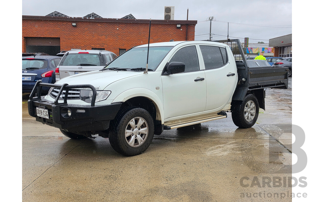 06/2014 Mitsubishi Triton GLX (4x4) MN MY14 UPDATE C/Chas dual cab White 2.5L
