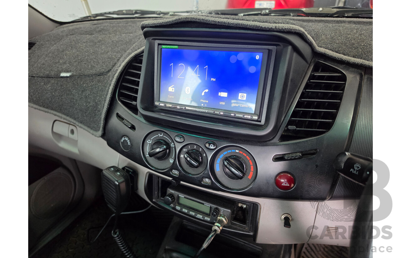 06/2014 Mitsubishi Triton GLX (4x4) MN MY14 UPDATE C/Chas dual cab White 2.5L