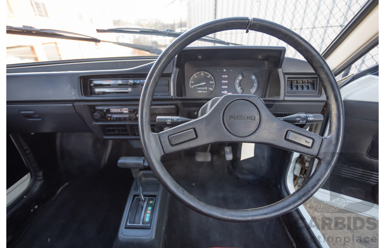 8/1985 Suzuki Mighty Boy (SS40T) 2d Pick Up Winter White 543cc