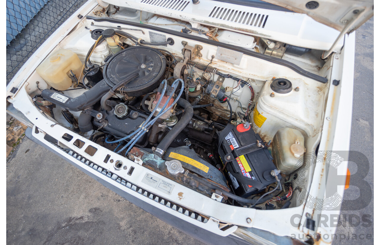 8/1985 Suzuki Mighty Boy (SS40T) 2d Pick Up Winter White 543cc