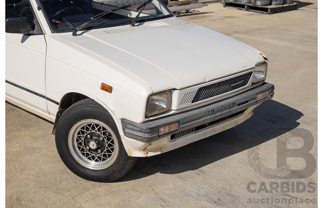 8/1985 Suzuki Mighty Boy (SS40T) 2d Pick Up Winter White 543cc