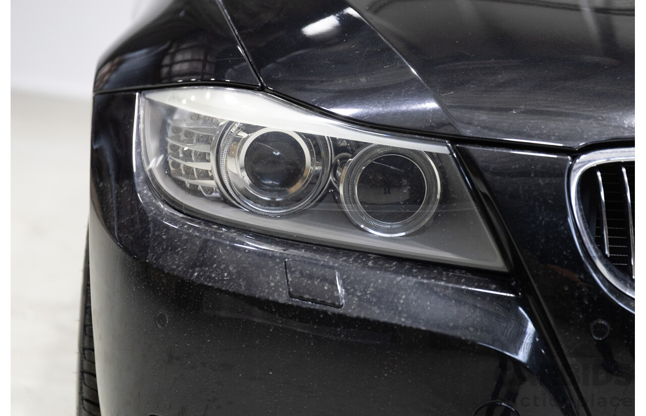 11/2011 BMW 3 20i LIFESTYLE (RWD) E90 MY11 4d Sedan Black 2.0L