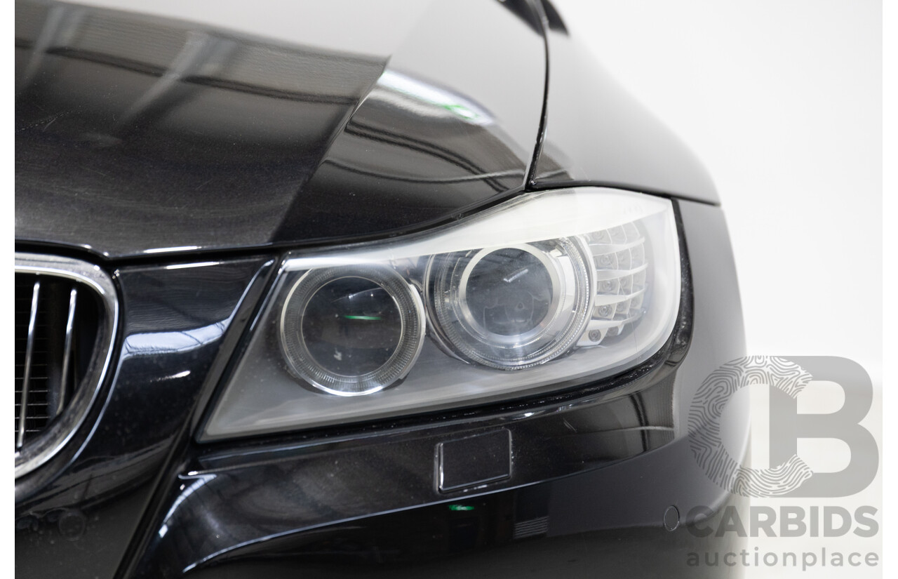 11/2011 BMW 3 20i LIFESTYLE (RWD) E90 MY11 4d Sedan Black 2.0L