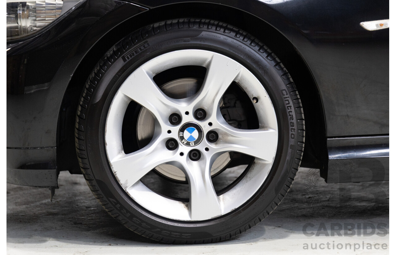 11/2011 BMW 3 20i LIFESTYLE (RWD) E90 MY11 4d Sedan Black 2.0L