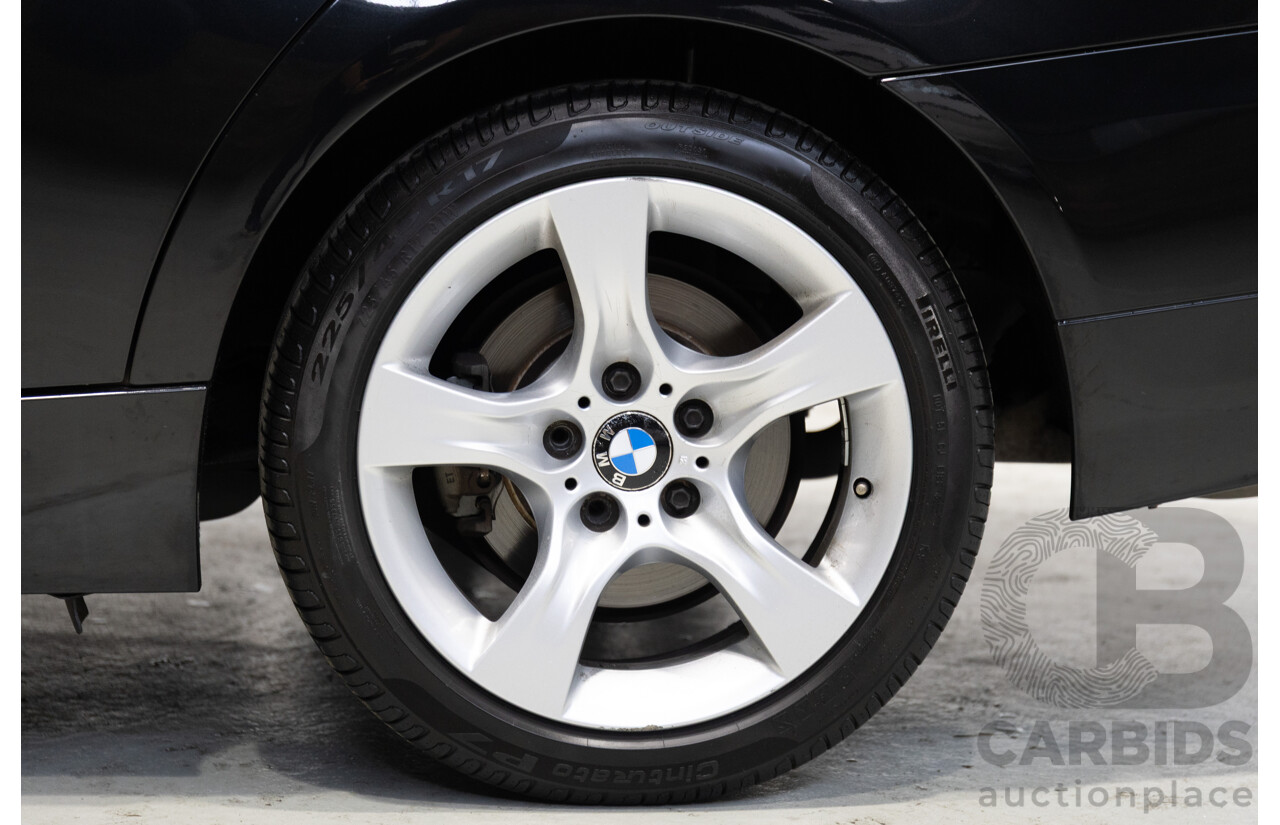 11/2011 BMW 3 20i LIFESTYLE (RWD) E90 MY11 4d Sedan Black 2.0L