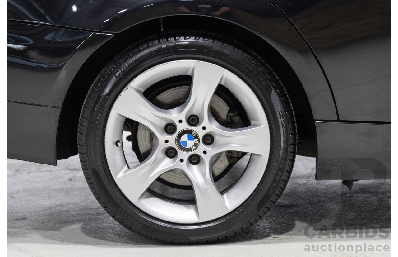 11/2011 BMW 3 20i LIFESTYLE (RWD) E90 MY11 4d Sedan Black 2.0L