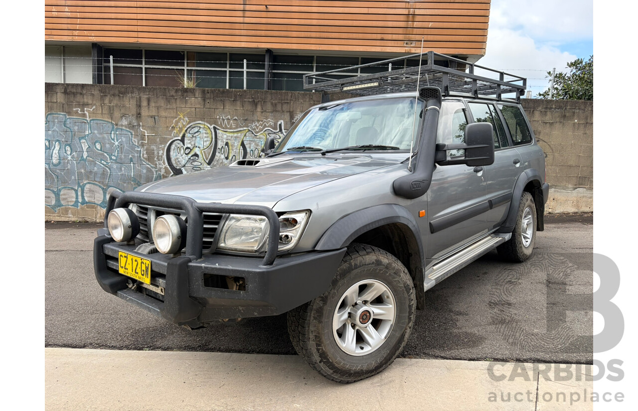 09/2003 Nissan Patrol ST (4x4) 4WD GU III 4D 7 Seat Wagon Silver Turbo Diesel 3.0L