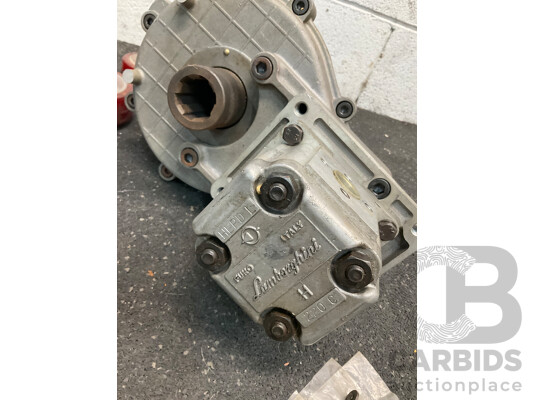 Collection of Hydraulic Agricultural Parts, Including Lamborighini Pump and Geardbox Assembly