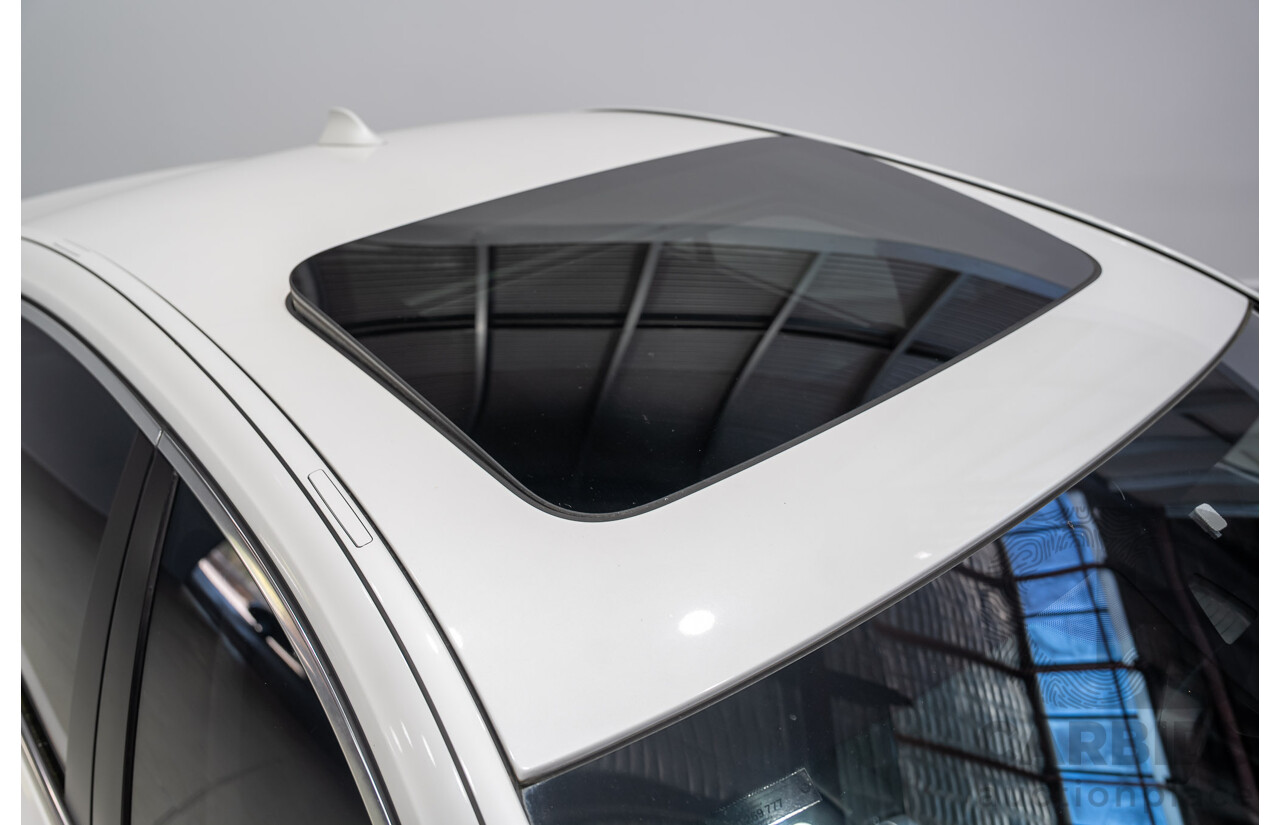 09/2013 BMW 740i F01 MY14 4d Sedan Mineral White Metallic Turbo 3.0L