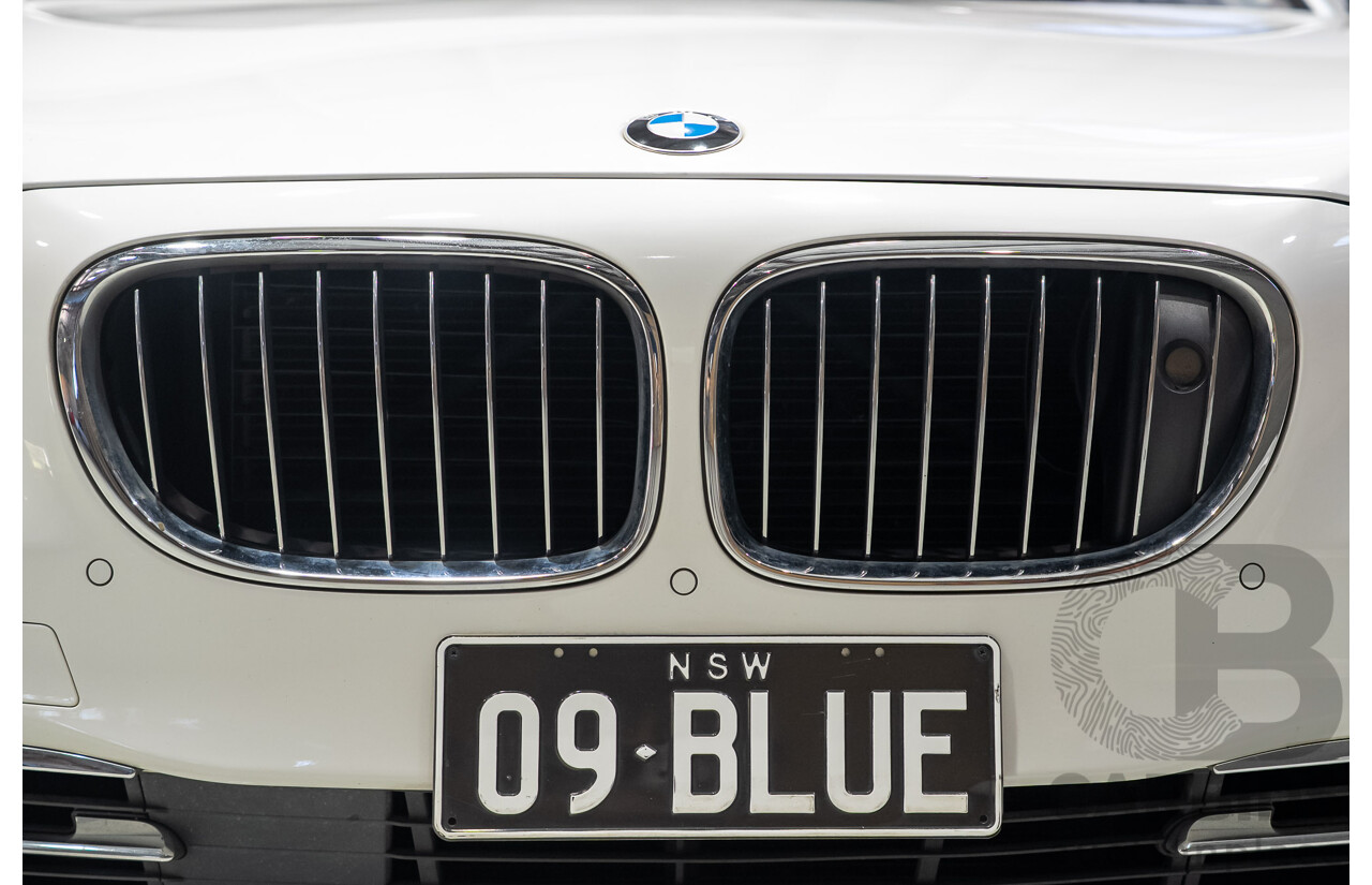 09/2013 BMW 740i F01 MY14 4d Sedan Mineral White Metallic Turbo 3.0L