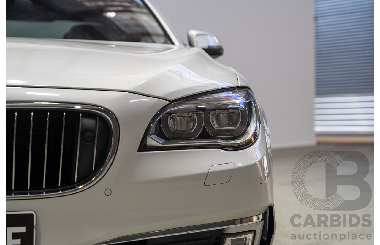 09/2013 BMW 740i F01 MY14 4d Sedan Mineral White Metallic Turbo 3.0L