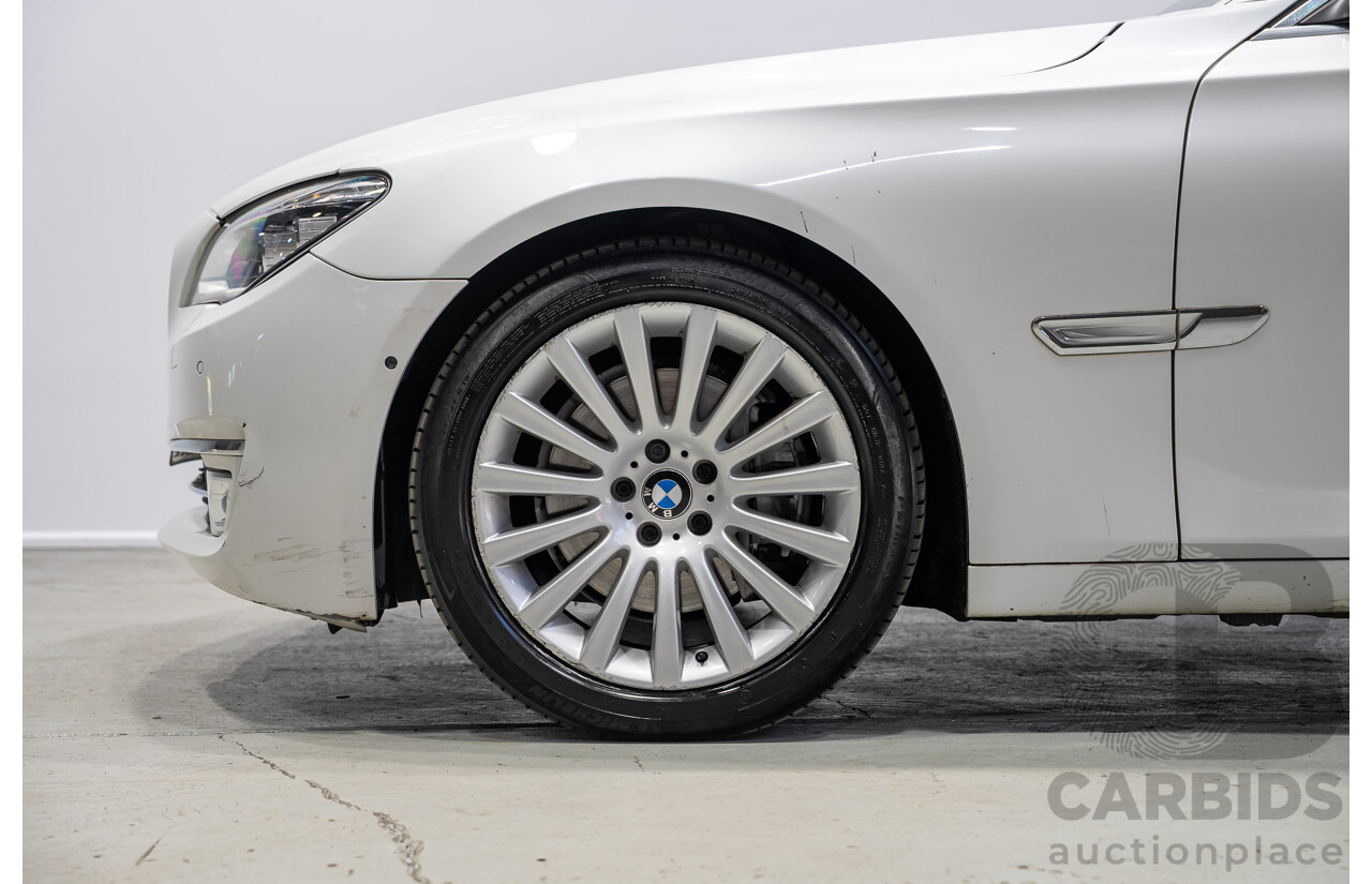 09/2013 BMW 740i F01 MY14 4d Sedan Mineral White Metallic Turbo 3.0L