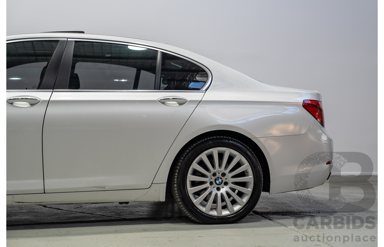 09/2013 BMW 740i F01 MY14 4d Sedan Mineral White Metallic Turbo 3.0L